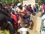 Getting water from the school well in Téréli.